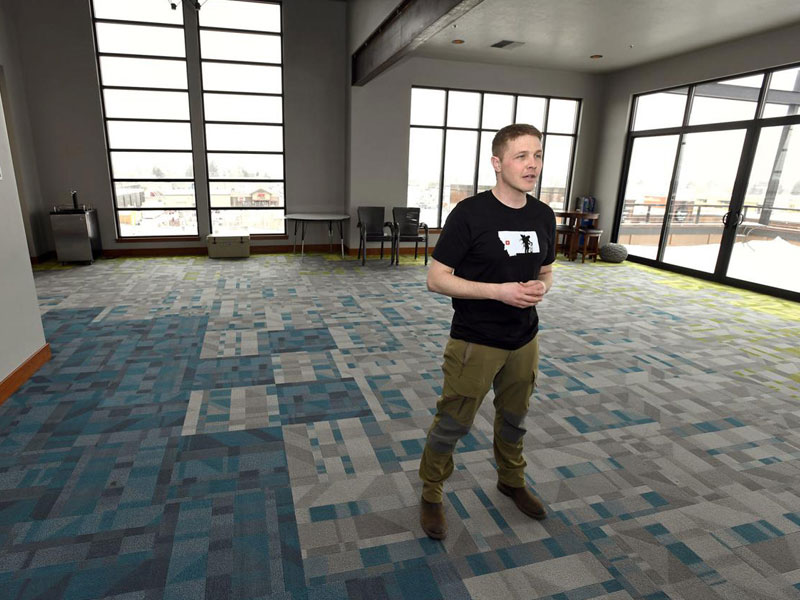 Eric Siegfried, founder of onX, stands on the top floor of the mapping technology company’s new building in Missoula. (Tom Bauer, Missoulian)