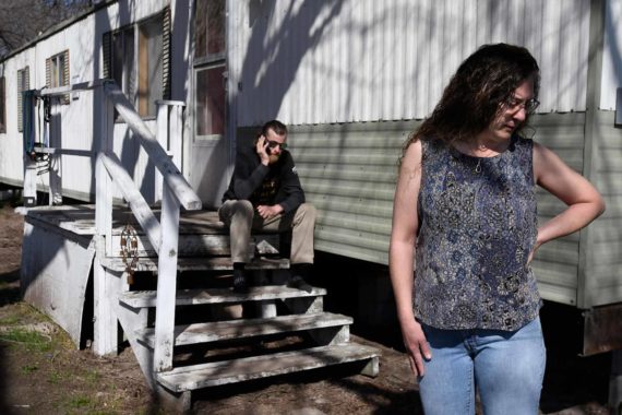Lena Faulconbridge stands outside her home in Missoula, Montana in 2018. She faced eviction from her trailer court because it was being developed into apartments. (AP Photo/Missoulian, Kurt Wilson)