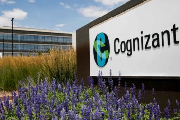 A logo sign stands outside Cognizant in Englewood, Colorado. Cognizant ATG plans to build a new tech campus in Missoula later this year. (AP Photo, Kristoffer Tripplaar)