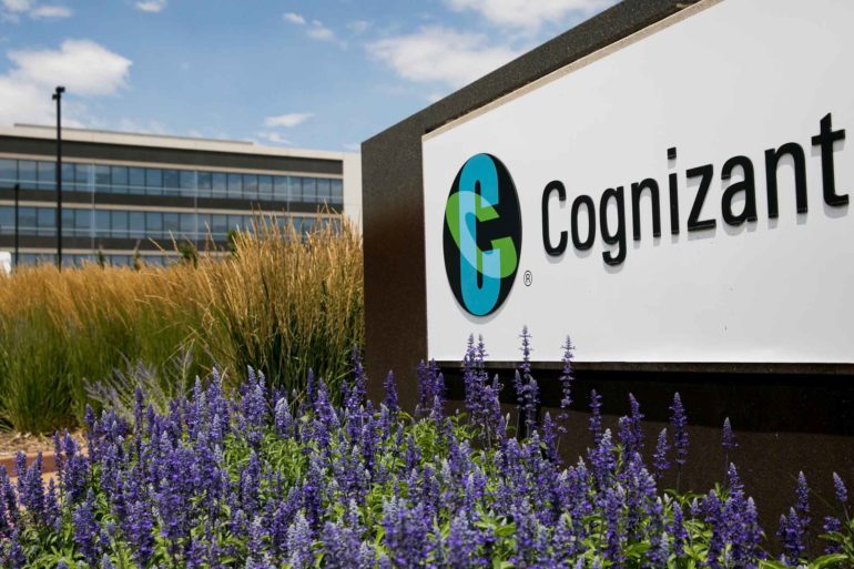 A logo sign stands outside Cognizant in Englewood, Colorado. Cognizant ATG plans to build a new tech campus in Missoula later this year. (AP Photo, Kristoffer Tripplaar)