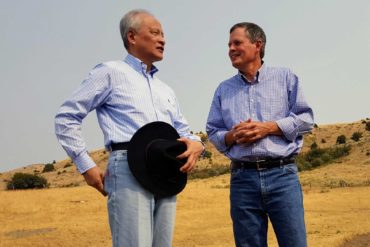 Chinese ambassador to the United States Cui Tiankai, left, speaks with U.S. Sen. Steve Daines about ways to expand the Chinese market for Montana beef. (Tom Lutey, Billings Gazette)