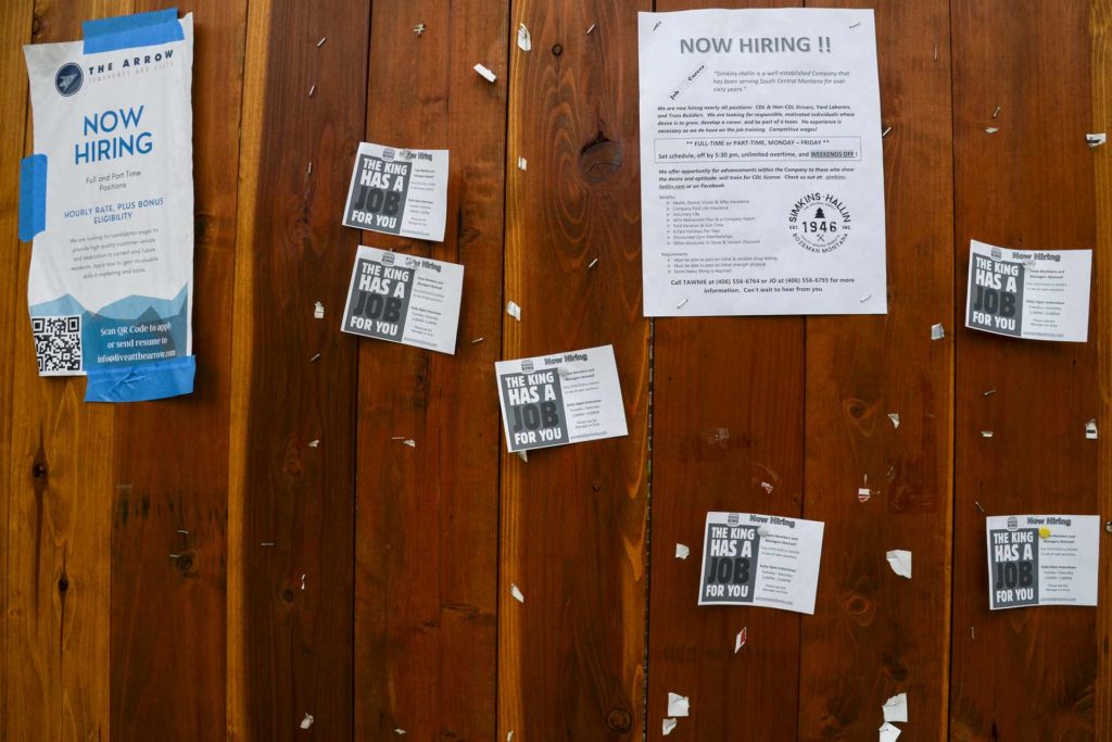 Help wanted signs are displayed on a bulletin board at Montana State University in Bozeman. Some employers are increasing their wages and some are offering signing bonuses. (Rachel Leathe, Bozeman Daily Chronicle)