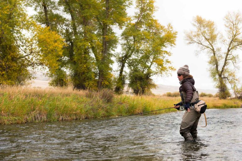 Erin McCleary fishes a small stream near Butte, Montana. (Bozeman Daily Chronicle)