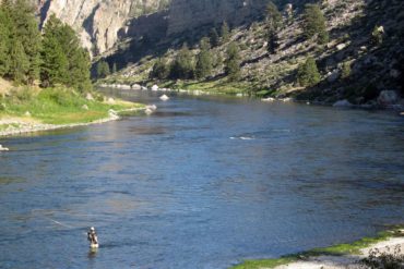 Steve Connole fishes in the Missouri River near Helena. (AP Photo, Matt Volz)