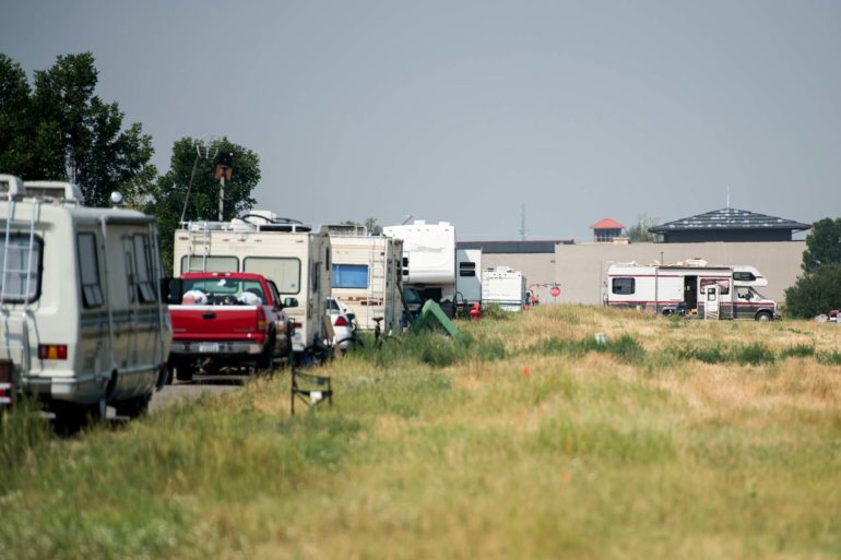 A row of RV's parked along Patrick Street in Bozeman. The tight market has pushed some in the city to reside in RVs, campers or trailers. (AP Photo, Rachel Leathe)